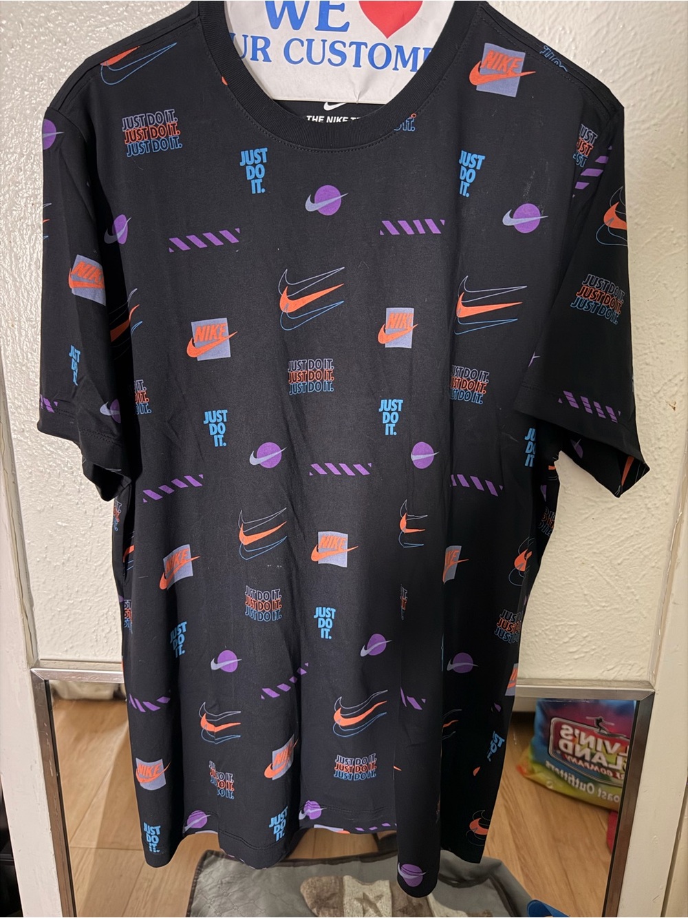 Nike Black Short Sleeve Tee with Orange, Purple & Blue Logos